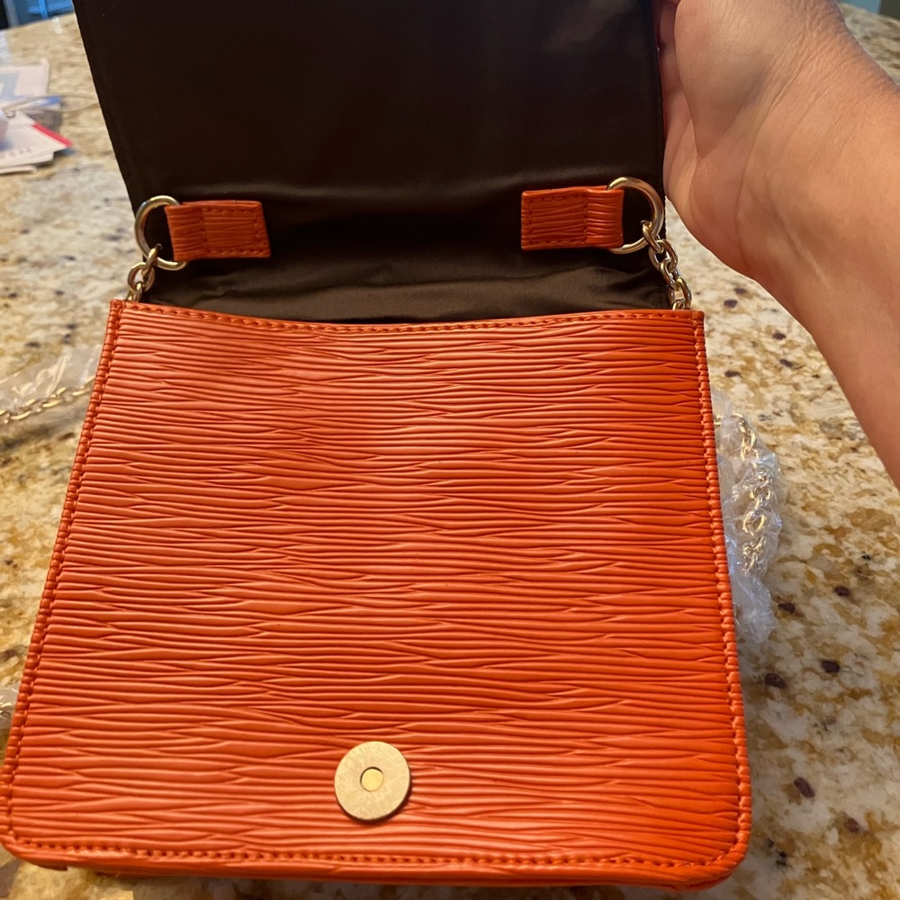 Tiffany and Fred new without tags orange leather Epi inspired crossbody bag.
